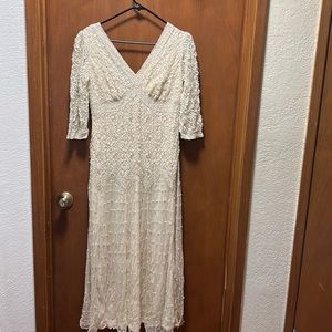 Beautiful beaded mother of the bride dress.